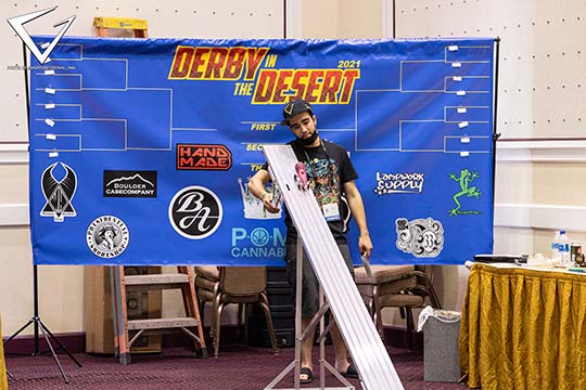 2021 - Derby in the Desert Boro Derby Racer with sponsors background