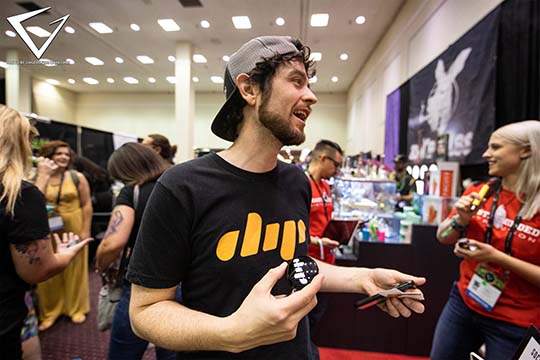 2021 - Dip Device Looking at booth