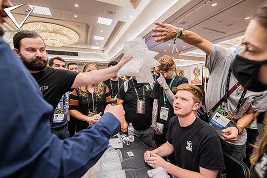 2021 - Exhibitor Busy at Booth